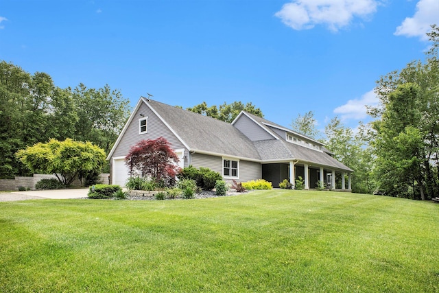 3778 22nd St, Dorr, MI 49323 - view of front of house featuring a front yard, concrete driveway, and roof with shingles