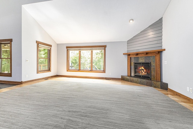 3778 22nd St, Dorr, MI 49323 - unfurnished living room with a fireplace and high vaulted ceiling