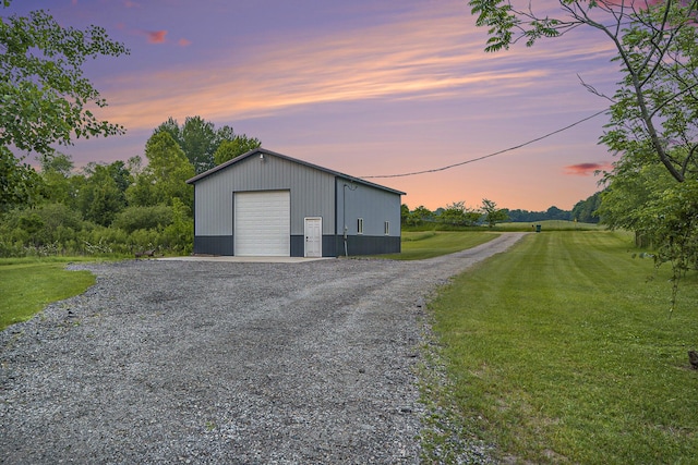 3778 22nd St, Dorr, MI 49323 - detached garage featuring driveway