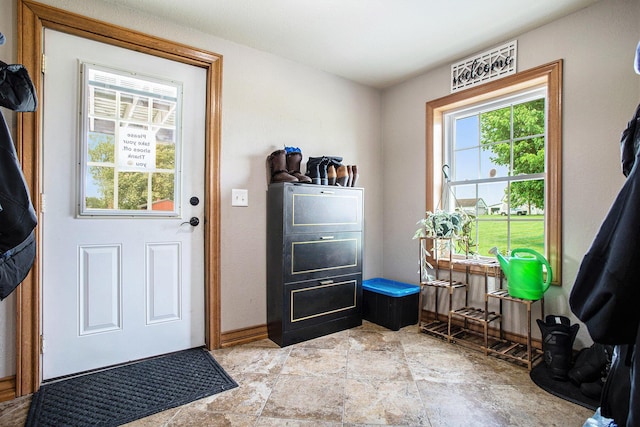 598 Dayburg Rd, Coldwater, MI 49036 - entryway featuring light stone finish flooring and baseboards