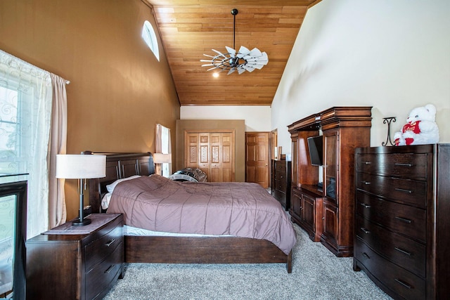 598 Dayburg Rd, Coldwater, MI 49036 - bedroom with high vaulted ceiling, light carpet, wooden ceiling, and a closet
