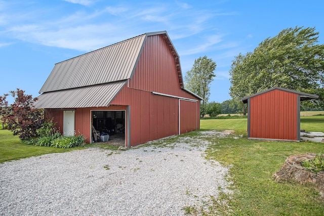 598 Dayburg Rd, Coldwater, MI 49036 - view of barn with a lawn and driveway