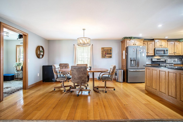 598 Dayburg Rd, Coldwater, MI 49036 - dining room featuring light wood-type flooring, a chandelier, and recessed lighting