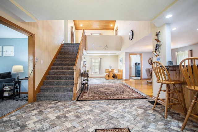 598 Dayburg Rd, Coldwater, MI 49036 - foyer entrance featuring stairway, stone finish flooring, and recessed lighting