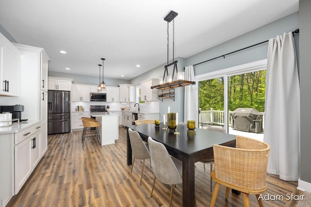 3980 Hathaway Rd, Kalamazoo, MI 49009 - dining room with wood finished floors and recessed lighting