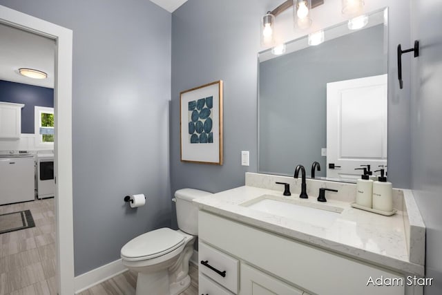 3980 Hathaway Rd, Kalamazoo, MI 49009 - bathroom with independent washer and dryer and vanity
