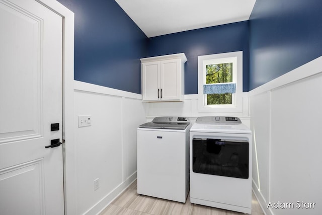 3980 Hathaway Rd, Kalamazoo, MI 49009 - laundry area with cabinet space and washer and clothes dryer