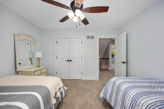 3980 Hathaway Rd, Kalamazoo, MI 49009 - bedroom with light colored carpet, a closet, and ceiling fan