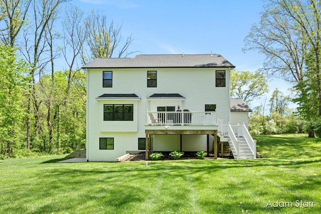 3980 Hathaway Rd, Kalamazoo, MI 49009 - rear view of property with stairs, a wooden deck, and a yard