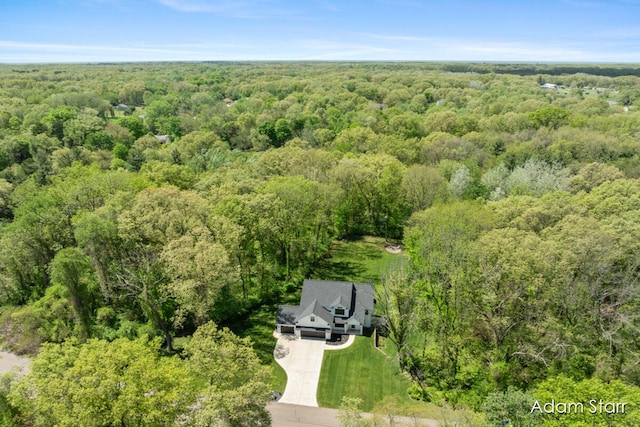 3980 Hathaway Rd, Kalamazoo, MI 49009 - aerial view of property and surrounding area featuring a heavily wooded area
