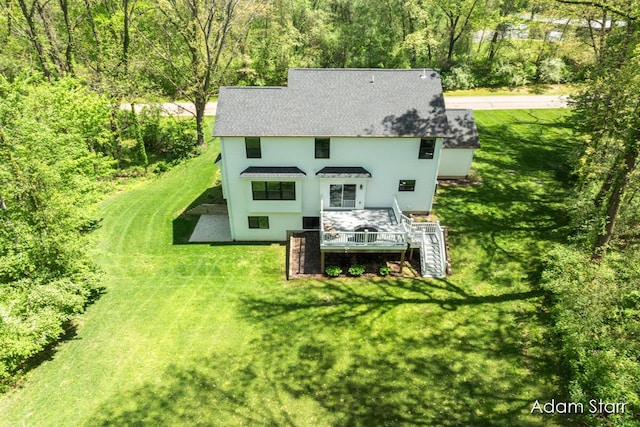 3980 Hathaway Rd, Kalamazoo, MI 49009 - rear view of property featuring stairs, a yard, and a shingled roof
