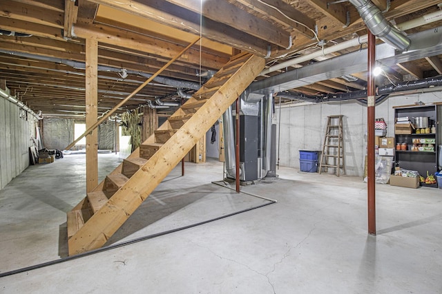 5293 Bartonville Rd, Belding, MI 48809 - unfinished below grade area with stairs and heating unit