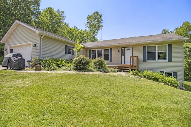 5293 Bartonville Rd, Belding, MI 48809 - single story home with a front lawn and an attached garage