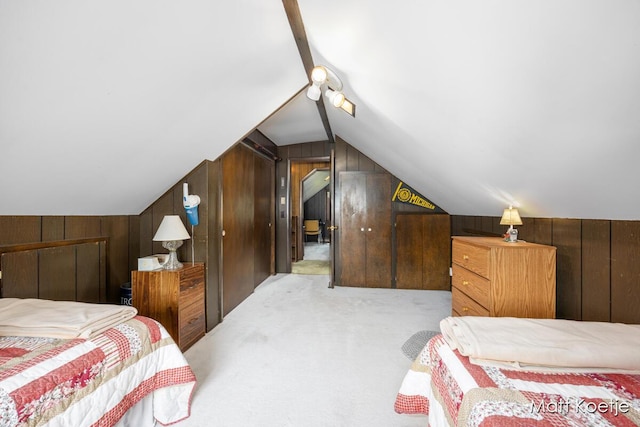 4410 Delaware Rd, Fremont, MI 49412 - carpeted bedroom featuring vaulted ceiling and wood walls