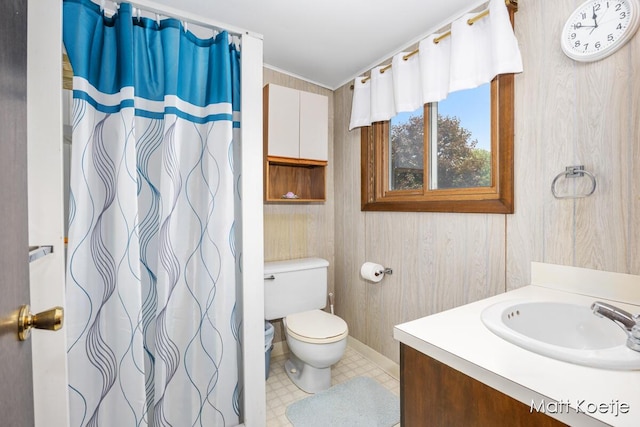 4410 Delaware Rd, Fremont, MI 49412 - bathroom with vanity, curtained shower, crown molding, and wooden walls