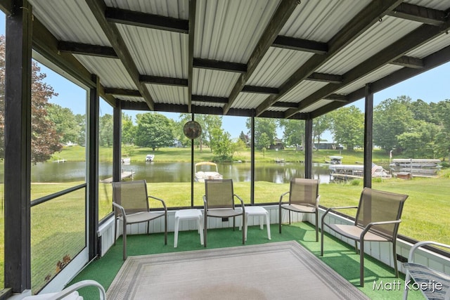 4410 Delaware Rd, Fremont, MI 49412 - sunroom featuring a water view, healthy amount of natural light, and view of wooded area