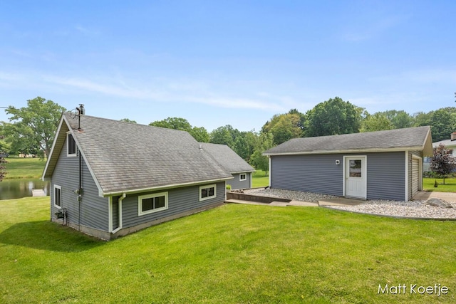 4410 Delaware Rd, Fremont, MI 49412 - back of house with a lawn