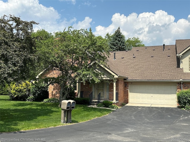 3 Cornell Ct Unit 27, Dearborn, MI 48124 - view of front of house with brick siding, asphalt driveway, a front lawn, and roof with shingles