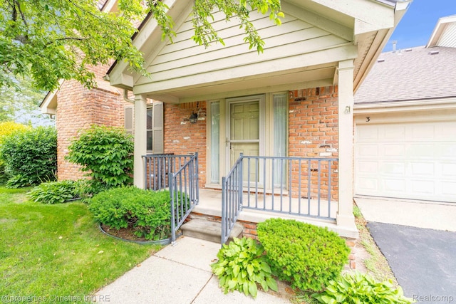 3 Cornell Ct Unit 27, Dearborn, MI 48124 - property entrance with brick siding, a garage, and covered porch