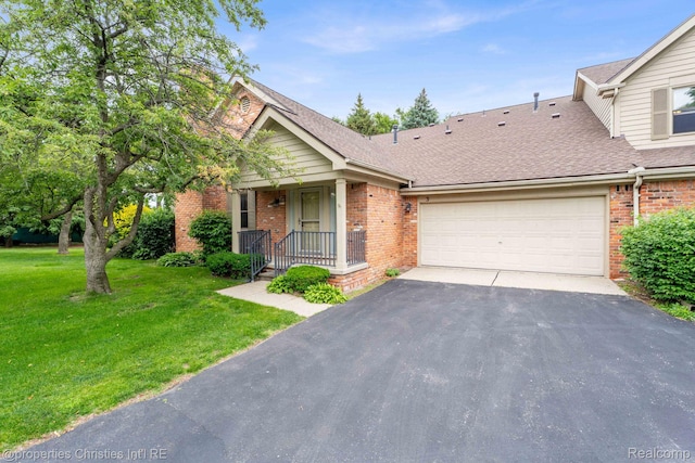 3 Cornell Ct Unit 27, Dearborn, MI 48124 - view of front of property with brick siding, asphalt driveway, a garage, and roof with shingles