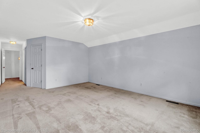 3 Cornell Ct Unit 27, Dearborn, MI 48124 - unfurnished room featuring carpet floors and vaulted ceiling