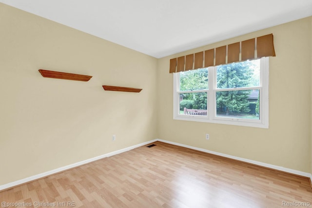 3 Cornell Ct Unit 27, Dearborn, MI 48124 - empty room with light wood-style floors