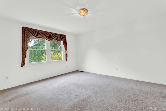 3 Cornell Ct Unit 27, Dearborn, MI 48124 - carpeted empty room with baseboards