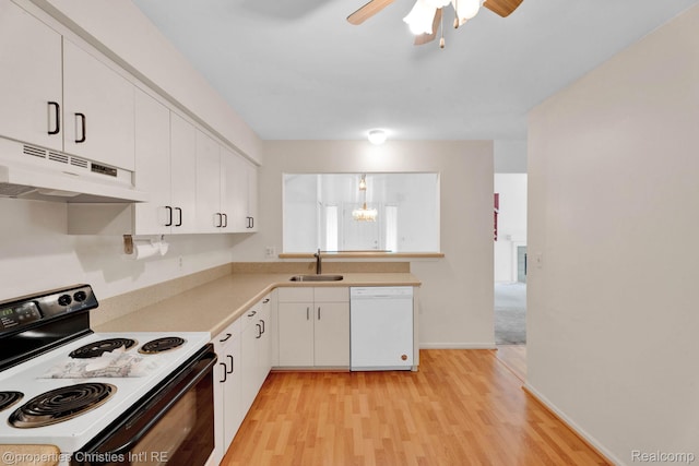 3 Cornell Ct Unit 27, Dearborn, MI 48124 - kitchen featuring white dishwasher, electric range, under cabinet range hood, white cabinets, and light wood finished floors
