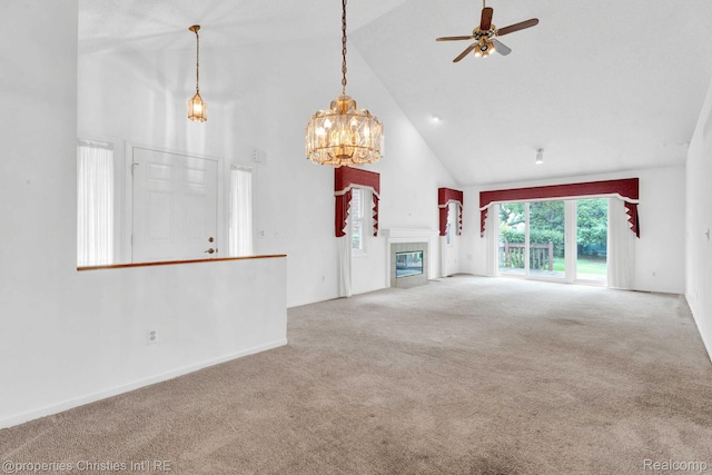 3 Cornell Ct Unit 27, Dearborn, MI 48124 - unfurnished living room with high vaulted ceiling, carpet, a ceiling fan, a chandelier, and a tile fireplace