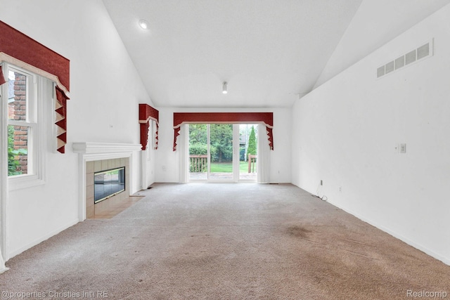 3 Cornell Ct Unit 27, Dearborn, MI 48124 - unfurnished living room featuring carpet flooring, a fireplace, and high vaulted ceiling