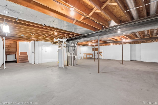 3 Cornell Ct Unit 27, Dearborn, MI 48124 - unfinished below grade area with stairs, heating unit, and water heater