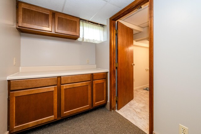 10001 Date Rd, Baroda, MI 49101 - kitchen with brown cabinetry and light countertops