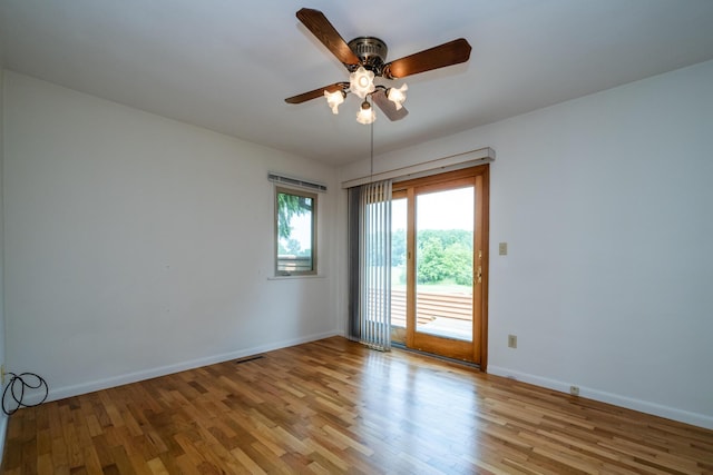 10001 Date Rd, Baroda, MI 49101 - spare room with wood finished floors and a ceiling fan