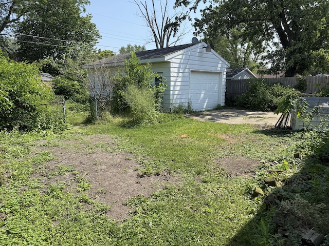 911 Napier Ave, Saint Joseph, MI 49085 - view of yard with a detached garage, an outdoor structure, and concrete driveway