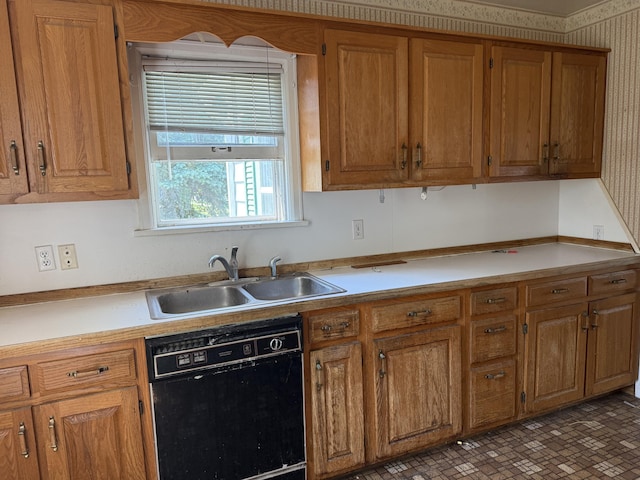 911 Napier Ave, Saint Joseph, MI 49085 - kitchen featuring dishwasher, brown cabinets, and light countertops
