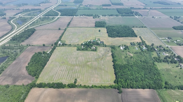 2523 E Wildcat, Saint Johns, MI 48879 - aerial overview of property's location with rural landscape and large plots for crops