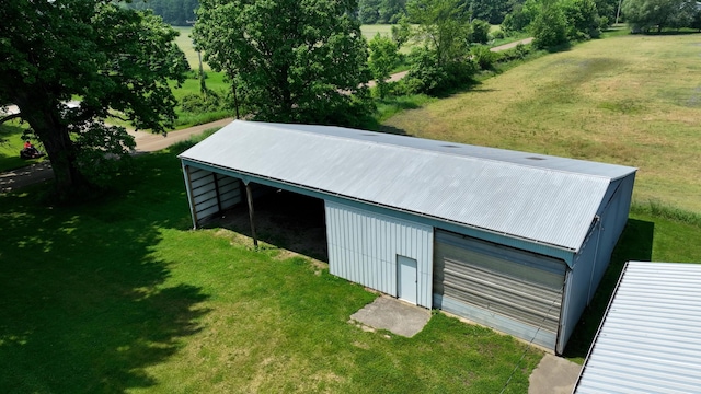 2523 E Wildcat, Saint Johns, MI 48879 - view of pole building with a lawn and driveway