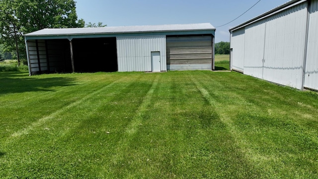 2523 E Wildcat, Saint Johns, MI 48879 - view of pole building with a lawn