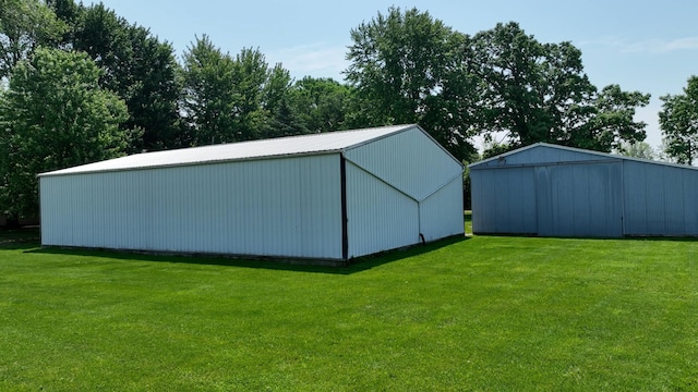 2523 E Wildcat, Saint Johns, MI 48879 - view of pole building featuring a lawn