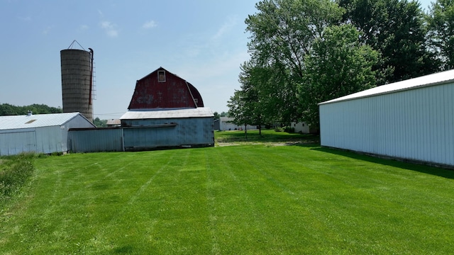 2523 E Wildcat, Saint Johns, MI 48879 - view of grassy yard with a barn and an outdoor structure