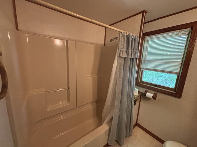 2523 E Wildcat, Saint Johns, MI 48879 - bathroom with shower / bath combo and crown molding