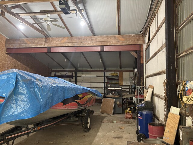2523 E Wildcat, Saint Johns, MI 48879 - garage featuring a garage door opener and ceiling fan