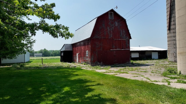 2523 E Wildcat, Saint Johns, MI 48879 - view of barn featuring a lawn