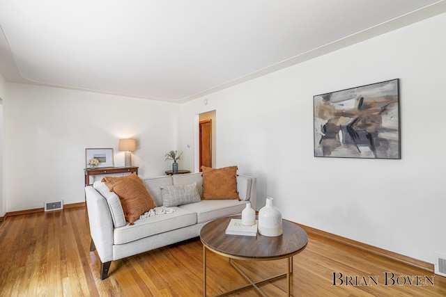 1665 7th St NW, Grand Rapids, MI 49504 - living area featuring wood finished floors and baseboards