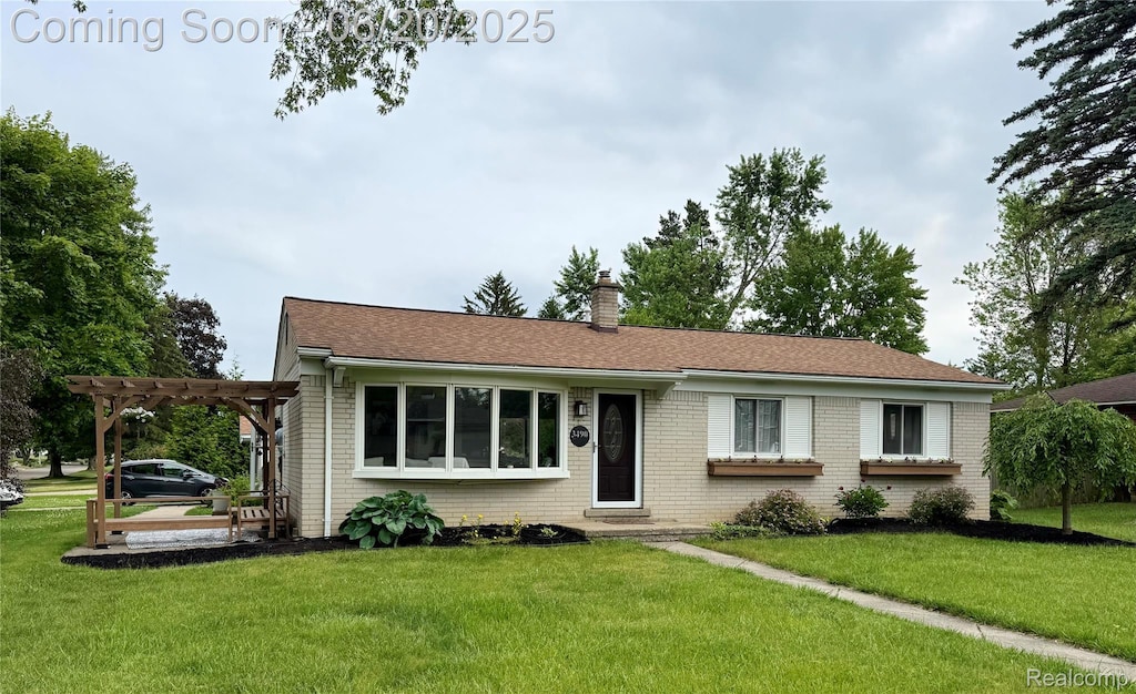 3490 Levee St, Waterford, MI 48329 - single story home with a pergola, entry steps, a chimney, a front lawn, and brick siding