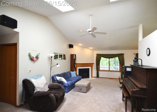 10010 Orchard Ridge Ct, Holly, MI 48442 - living area with lofted ceiling, light carpet, ceiling fan, a skylight, and a fireplace
