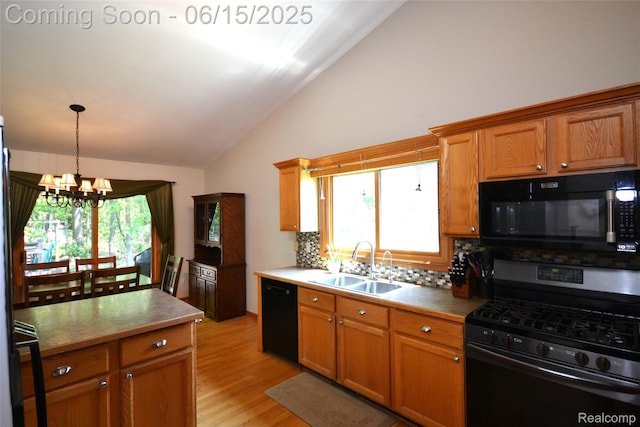 10010 Orchard Ridge Ct, Holly, MI 48442 - kitchen featuring black appliances, vaulted ceiling, a chandelier, backsplash, and light wood-style flooring