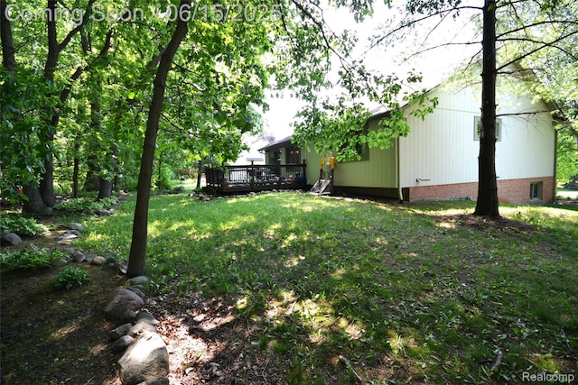 10010 Orchard Ridge Ct, Holly, MI 48442 - view of green lawn featuring a wooden deck