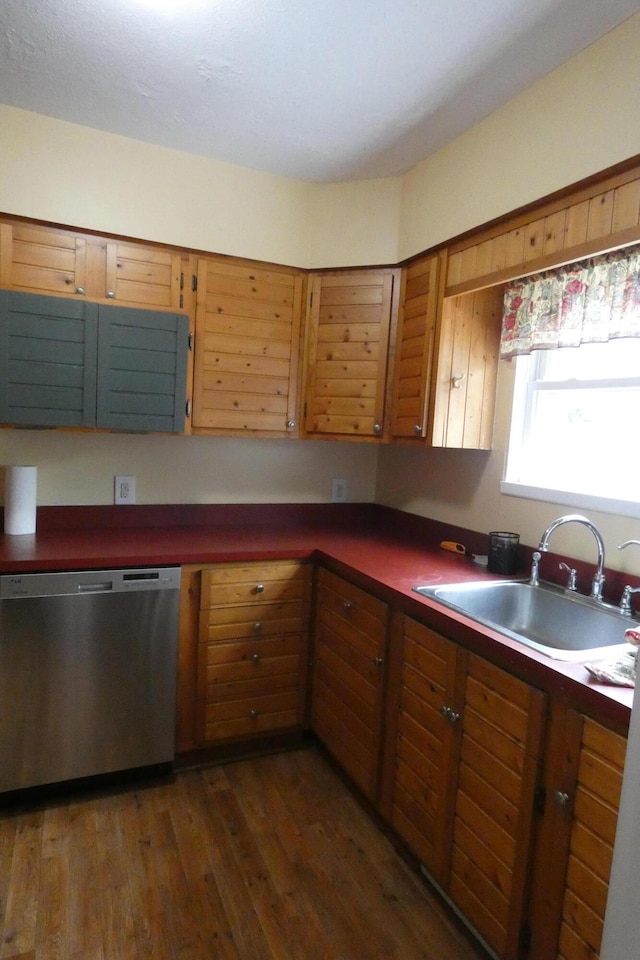552 W Main St, Niles, MI 49120 - kitchen featuring dishwasher, dark countertops, dark wood-style floors, and brown cabinetry