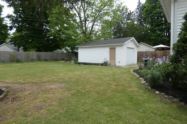 552 W Main St, Niles, MI 49120 - view of yard with an outdoor structure and a garage